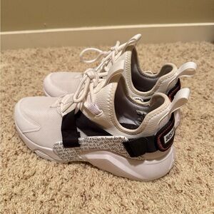 Nike White and Black Sneakers with Text Detail